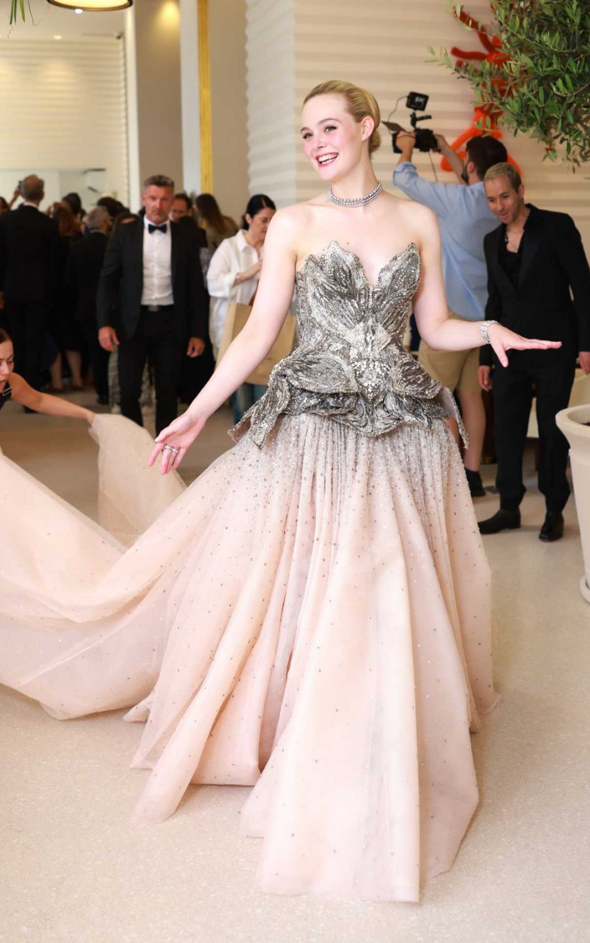 Elle Fanning Arrives at the Martinez Hotel During the 76th Cannes Film