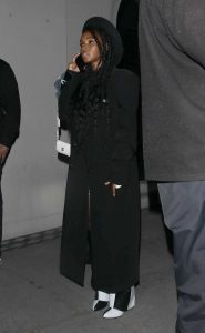 Janelle Monae in a Black Coat