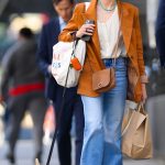 Naomi Watts in an Orange Blazer Steps Out with Her Pooch During a Shopping Trip in Tribeca in NYC 05/16/2023