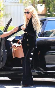 Rachel Zoe in a Black Ensemble