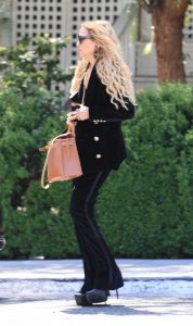 Rachel Zoe in a Black Ensemble