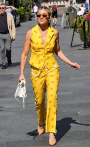 Ashley Roberts in a Bright Yellow Pantsuit