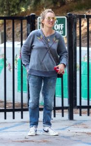 Becki Newton in a Grey Sweatshirt