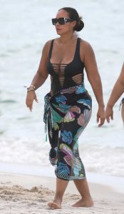 Evelyn Lozada in a Black Cutout Swimsuit