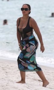 Evelyn Lozada in a Black Cutout Swimsuit