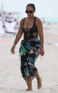 Evelyn Lozada in a Black Cutout Swimsuit