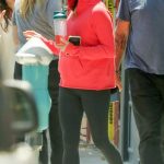 Jennifer Aniston in a Red Hoodie Exits the Gym with Her Bodyguard in West Hollywood 06/28/2023
