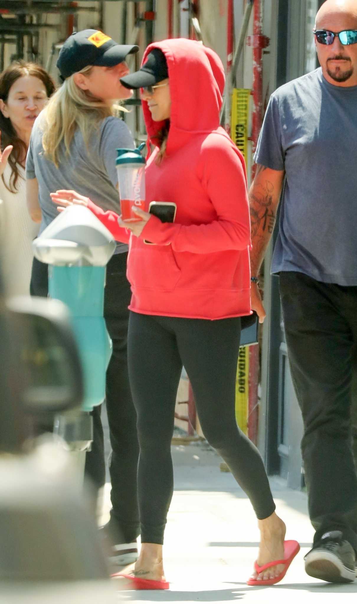 Jennifer Aniston in a Red Hoodie