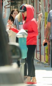 Jennifer Aniston in a Red Hoodie