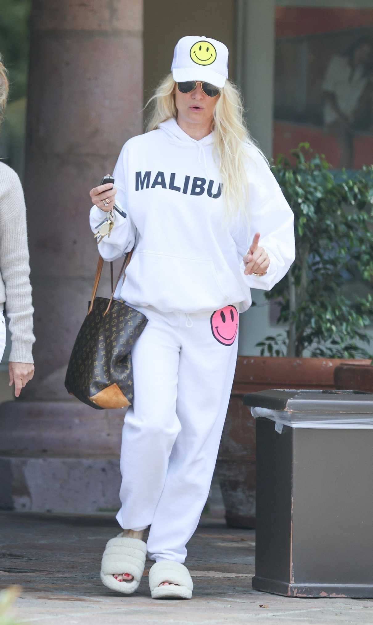 Nicollette Sheridan in a White Sweatsuit