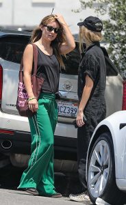 Olivia Wilde in a Green Track Pants
