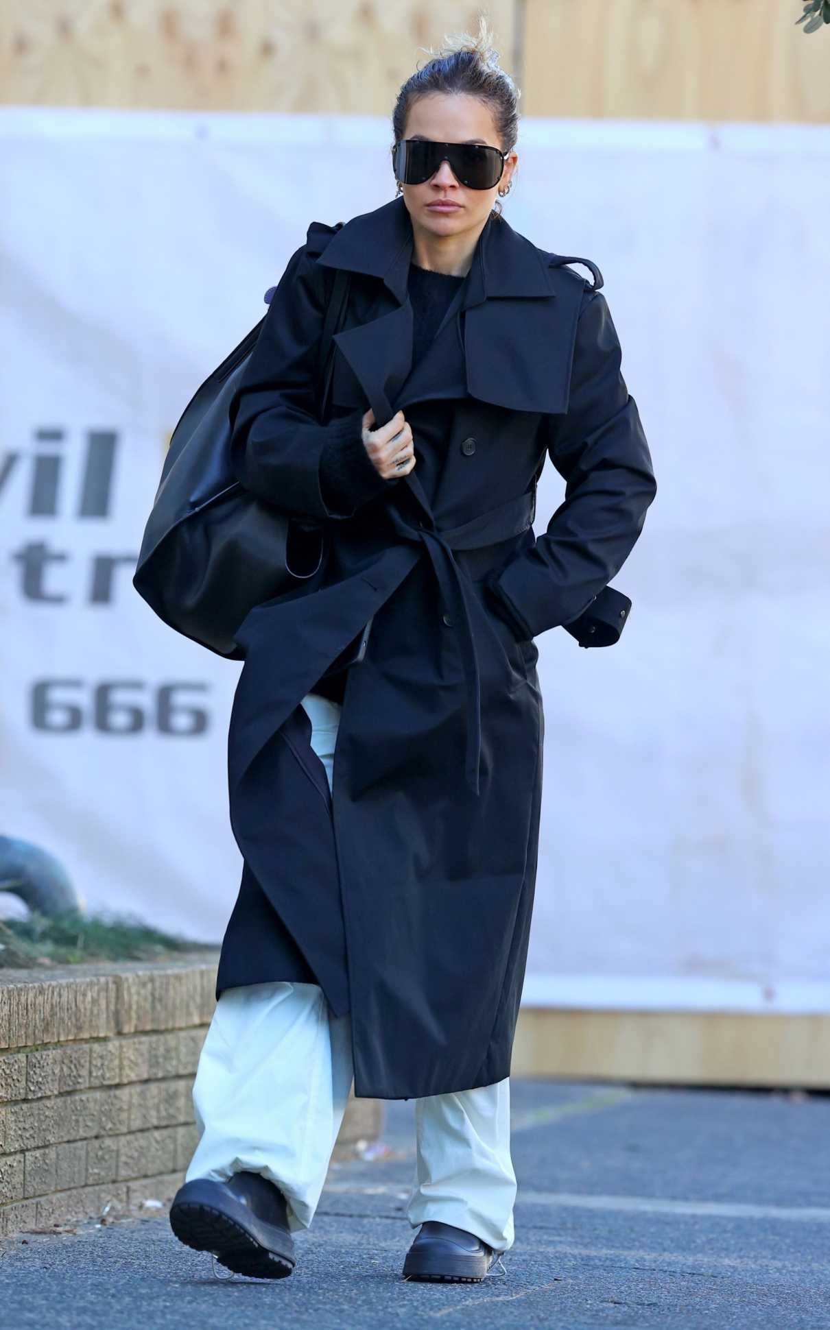 Rita Ora in a Navy Trench Coat