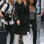 Angelina Jolie in a Black Trench Coat Arrives at JFK Airport in New York 07/15/2023