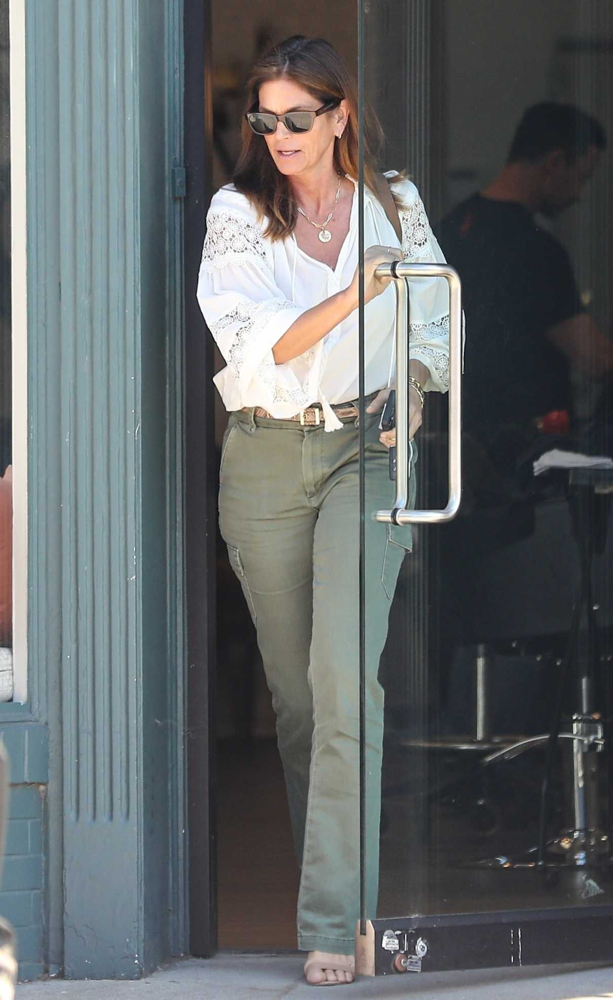 Cindy Crawford in an Olive Pants