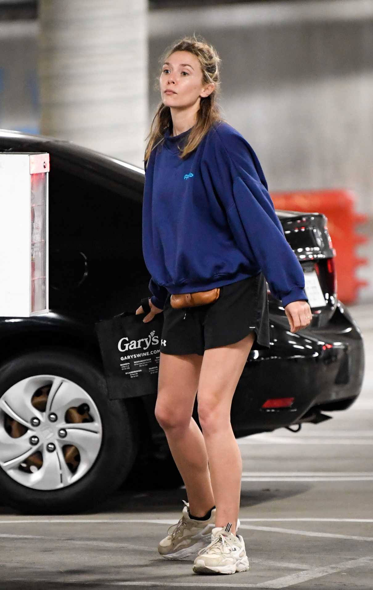 Elizabeth Olsen in a Blue Sweatshirt Goes Shopping at Whole Foods in