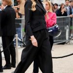 Gwendoline Christie in a Black Pantsuit Arrives at the Schiaparelli Haute Couture Show as Part of 2023 Paris Fashion Week in Paris 07/03/2023