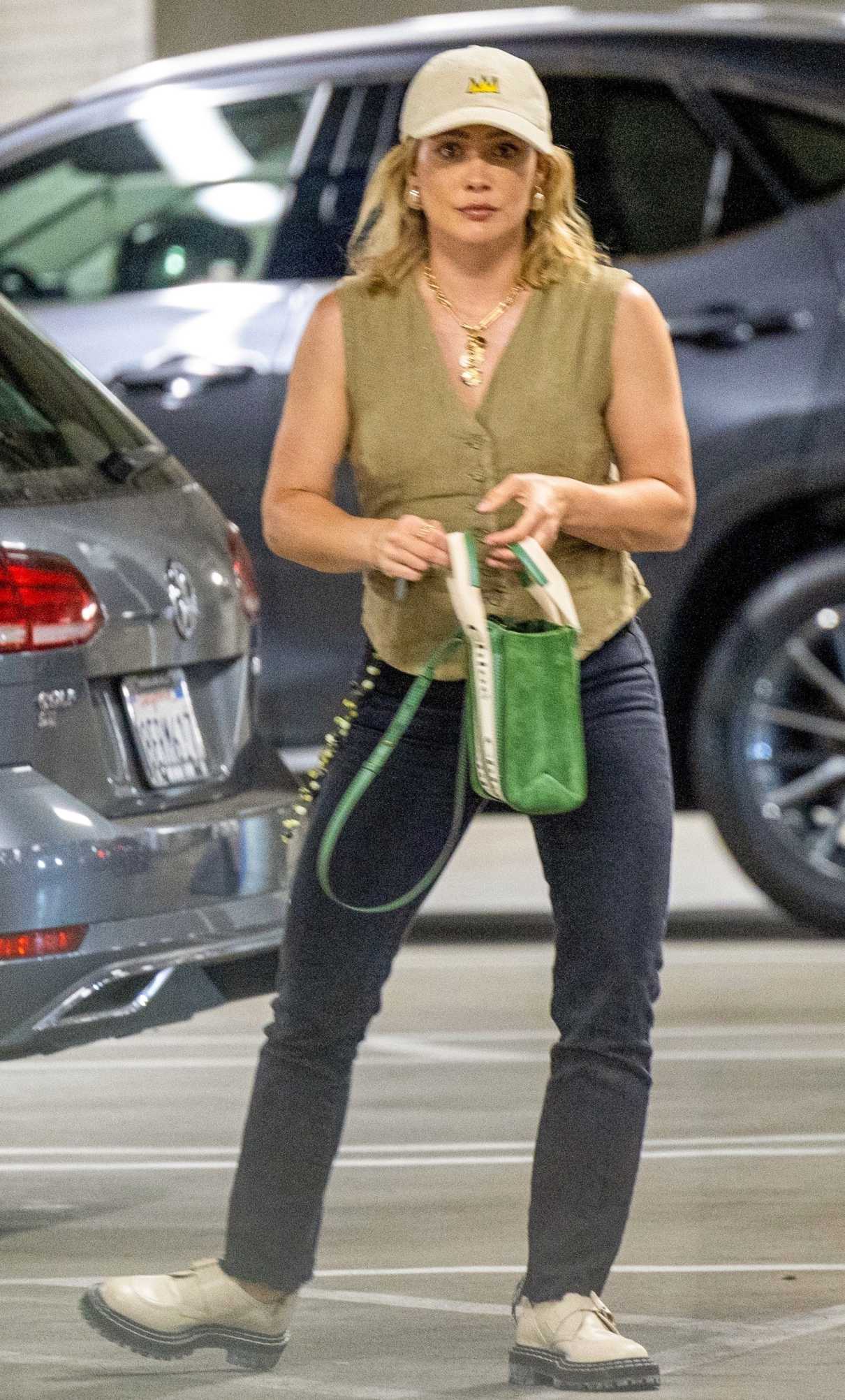 Hilary Duff in an Olive Vest
