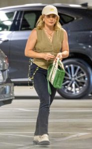 Hilary Duff in an Olive Vest