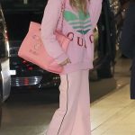 Margot Robbie in a Pink Sweatshirt Arrives at the Sydney Airport in Sydney 06/30/2023