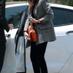 Nina Dobrev in a Grey Blazer Arrives at the San Vicente Bungalows in West Hollywood 07/19/2023