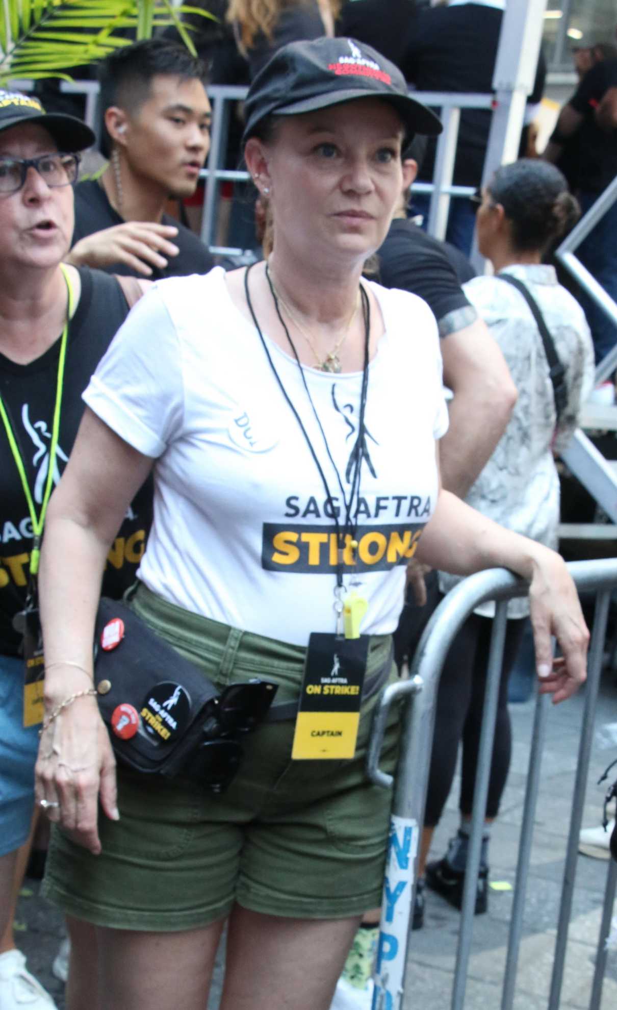 Samantha Mathis in a White Tee Attends the SAG-AFTRA and WGA Strike in