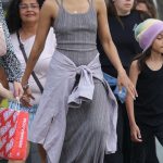 Zoe Saldana in a Grey Dress Was Spotted Out with Her Family in Paris 07/16/2023