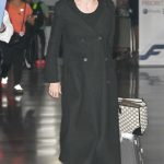 Angelina Jolie in a Black Coat Arrives at JFK Airport in New York City 08/15/2023