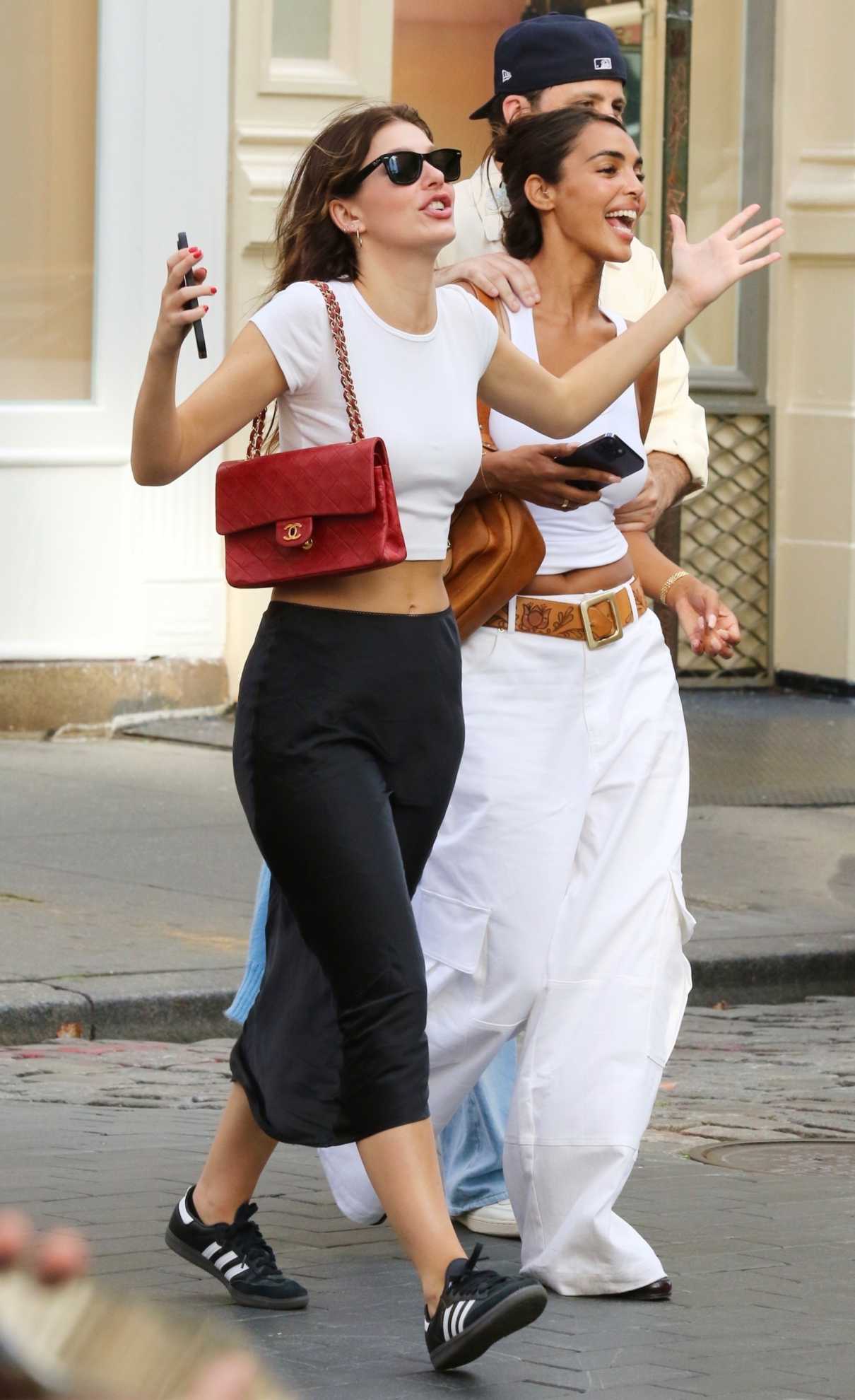 Camila Morrone in a White Cropped Tee Was Seen Out with Friends Around ...