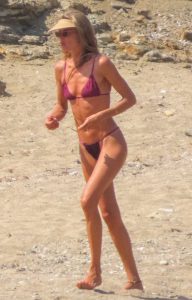 Doutzen Kroes in a Tiny Plum Bikini