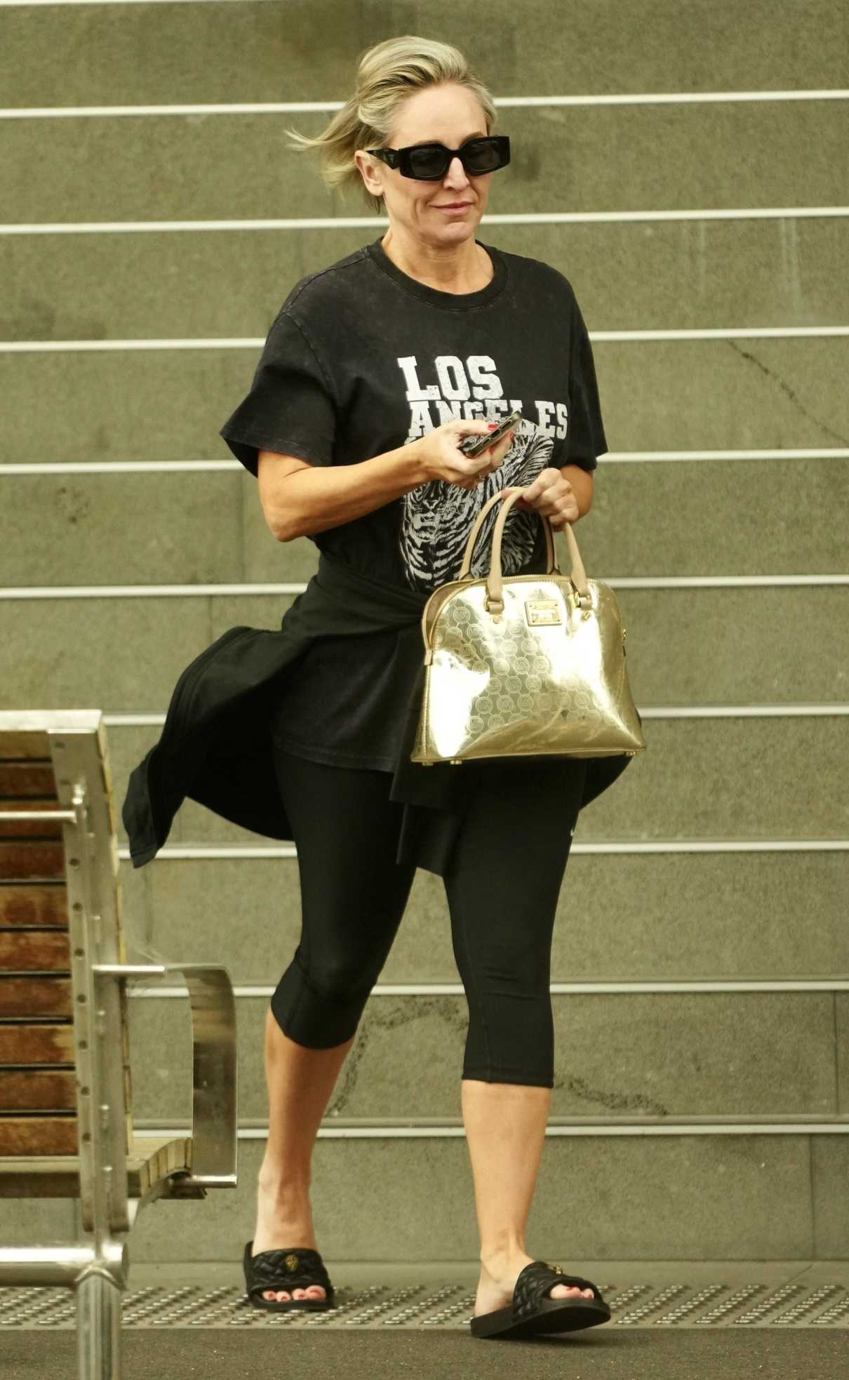 Fifi Box in a Black Tee
