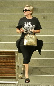 Fifi Box in a Black Tee