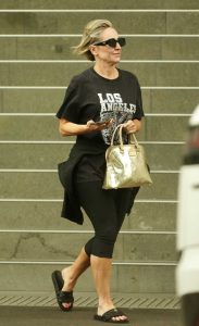 Fifi Box in a Black Tee