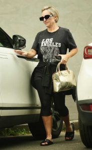 Fifi Box in a Black Tee