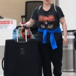 Hayden Panettiere in a Black Tee Arrives at LAX Airport in Los Angeles 08/25/2023