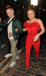 Jaime Winstone in a Red Pants