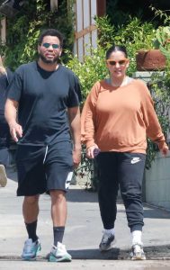 Khatira Rafiqzada in an Orange Sweatshirt
