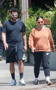 Khatira Rafiqzada in an Orange Sweatshirt