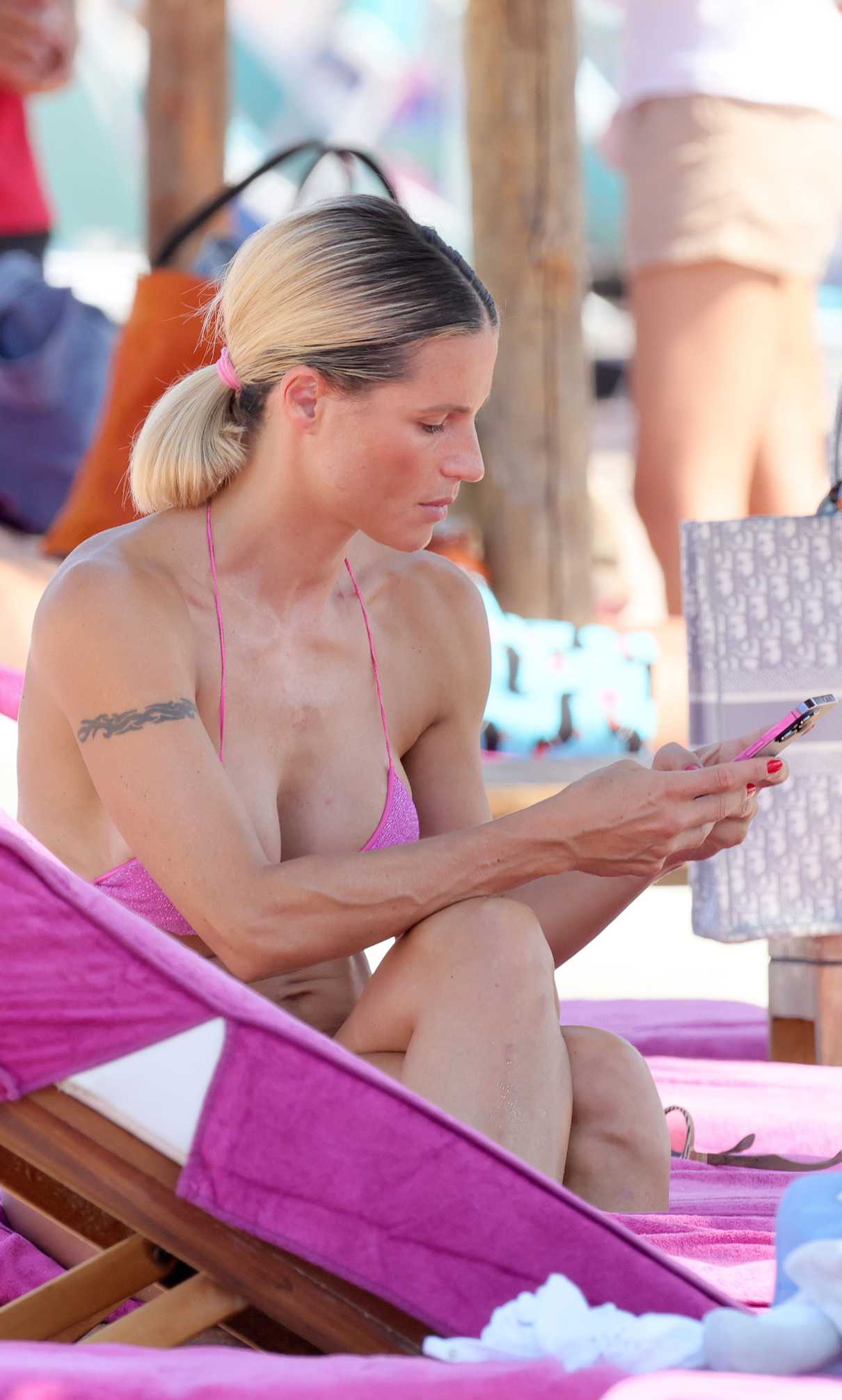 Michelle Hunziker in a Lilac Bikini