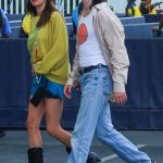 Rainey Qualley in a Blue Mini Skirt Arrives with a Friend for Taylor Swift’s Last Performance at SOFI Stadium in Inglewood 08/09/2023