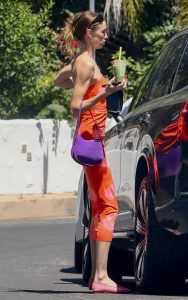 Whitney Port in an Orange Dress