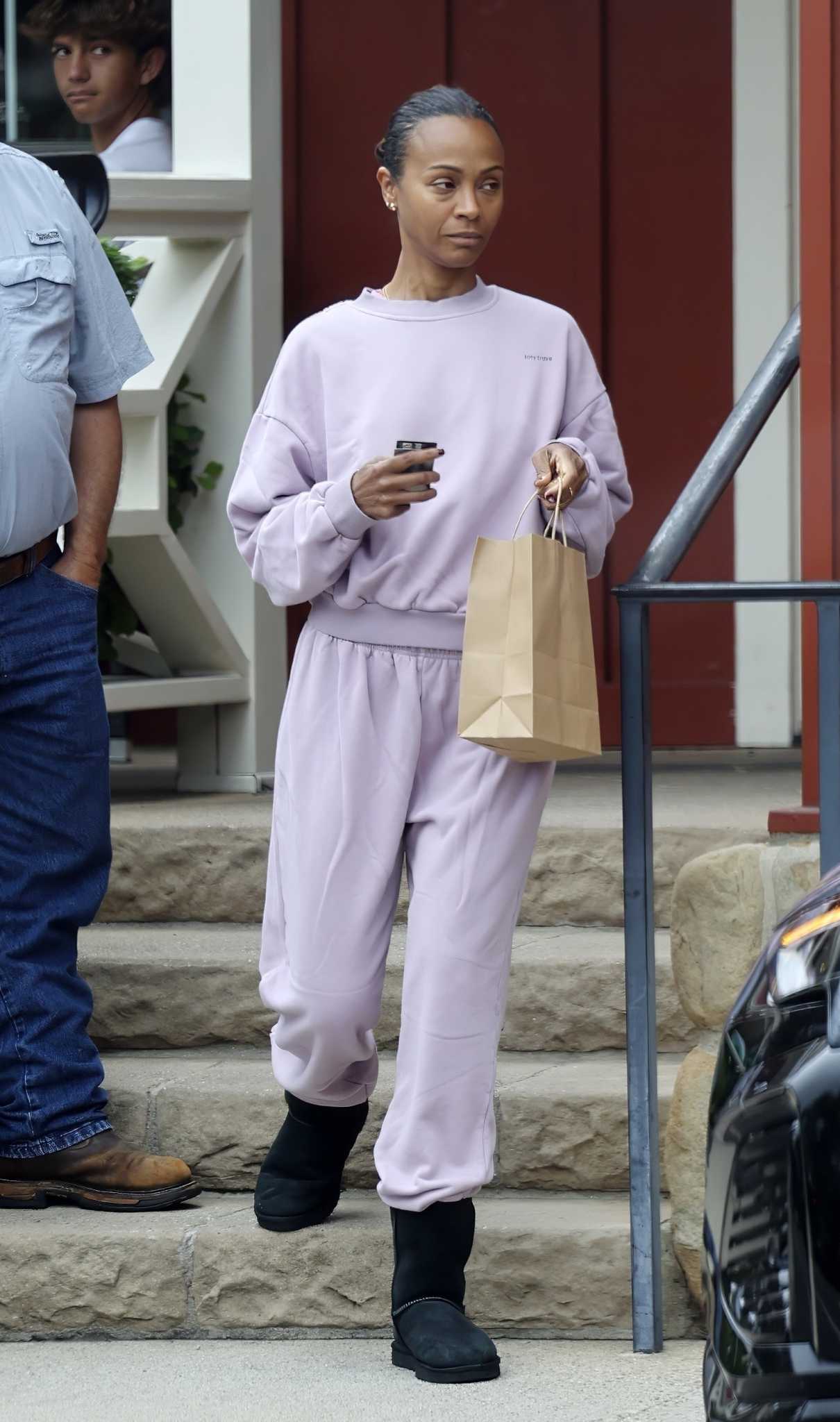 Zoe Saldana in a Lilac Sweatsuit