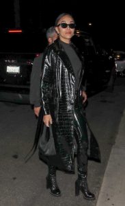 Ashley Madekwe in a Black Leather Trench Coat