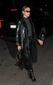 Ashley Madekwe in a Black Leather Trench Coat