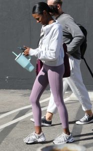 Charity Lawson in a Purple Leggings