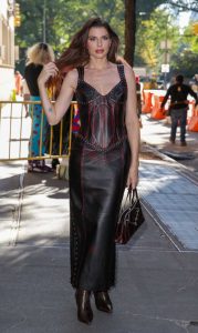 Julia Fox in a Black Leather Dress