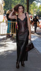 Julia Fox in a Black Leather Dress