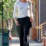 Margaret Qualley in a White Long Sleeves T-Shirt Was Spotted Out in West Hollywood 10/17/2023