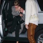 Taylor Swift in a Grey Trench Coat Heads to the SNL Afterparty with Travis Kelce in New York 10/14/2023
