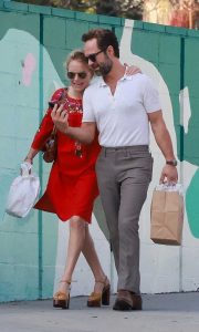 Becki Newton in a Red Dress