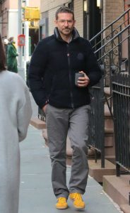 Bradley Cooper in a Yellow Sneakers